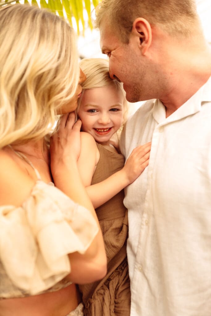 A lifestyle family session that is focused on connection and unprompted moments captured by a Kansas City Photographer