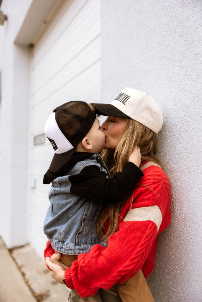 Kansas City family photographer documenting real motherhood moments in Smithville, MO